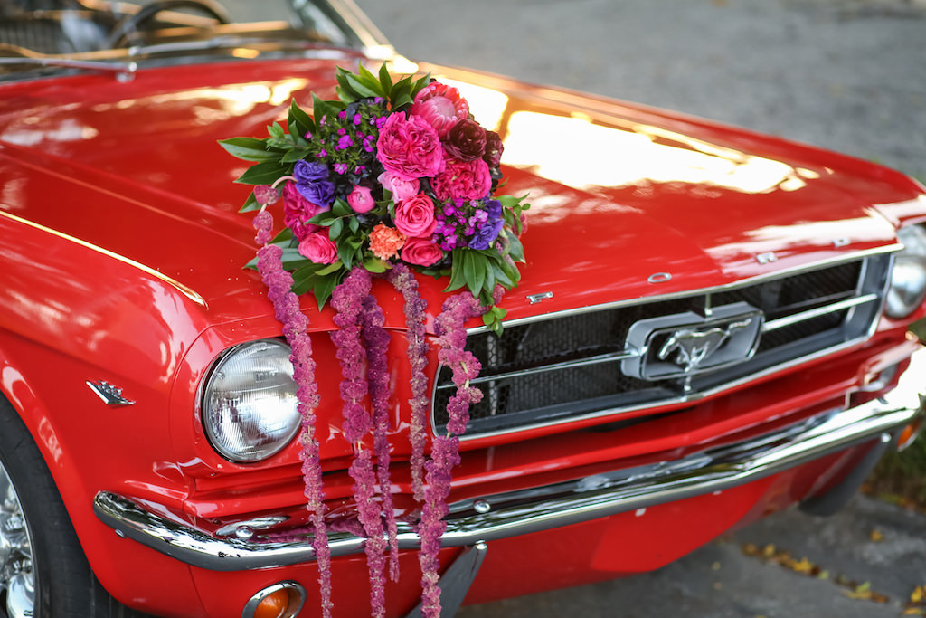 Pink, Fuchsia, Purple and Plum with Greenery Cascading Wedding Bouquet on Red Vintage Mustang | Tampa Bay Wedding Florist Gabro Event Services | Planner Kelly Kennedy Weddings and Events
