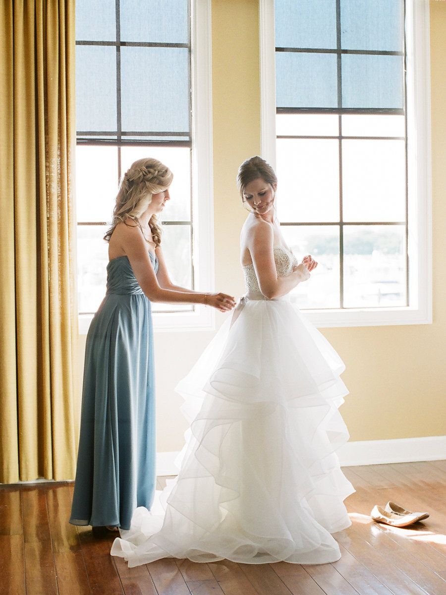 Bride Getting Ready Portrait in Layered Ballgown Wedding Dress, Bridesmaid in Long Dusty Blue Dress | Tampa Wedding Venue The Westshore Yacht Club