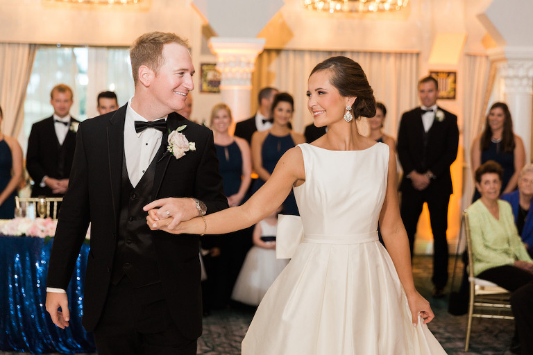 Bride and Groom First Dance Portrait, Groom in BLack Tux with Blush Pink Boutonniere, Bride in Belted Rosa Clara Bridal Dress | St Pete Wedding Hair and Makeup Michele Renee The Studio