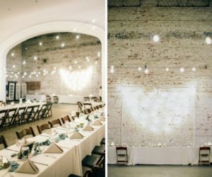 Vintage Travel Inspired Minimalist Wedding Reception with Long Feasting Tables, Wooden Folding Chairs, Taupe Napkins and Ivory Linen, Low Greenery Garland Centerpiece, and String Lights | Exposed Brick Walled Historic Downtown Tampa Wedding Venue The Rialto Theatre | Planner Glitz Events | Rentals A Chair Affair