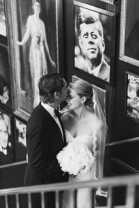 Indoor Staircase Bride and Groom Portrait with Vintage Portraits | Tampa Bay Wedding Photographer Ailyn La Torre Photography | Venue The Oxford Exchange