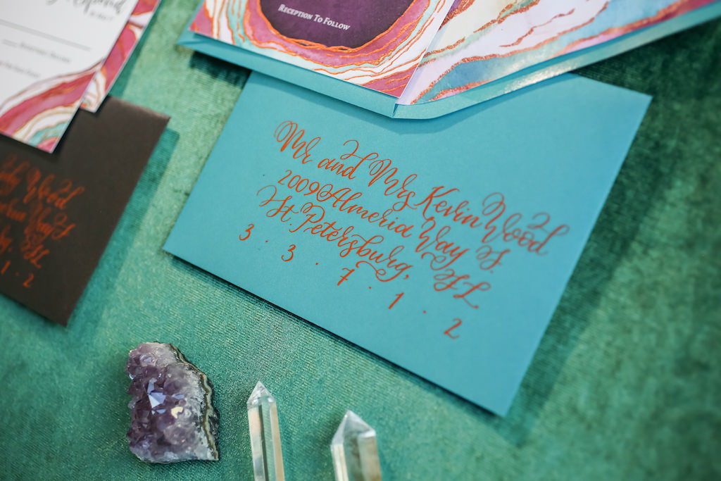 Pink, Purple and Turquoise Agate Inspired Wedding Invitation Suite with Copper Foil Script on Blue and Black Envelope | Tampa Bay Wedding Stationery Designer and Calligrapher Sarah Bubar Designs