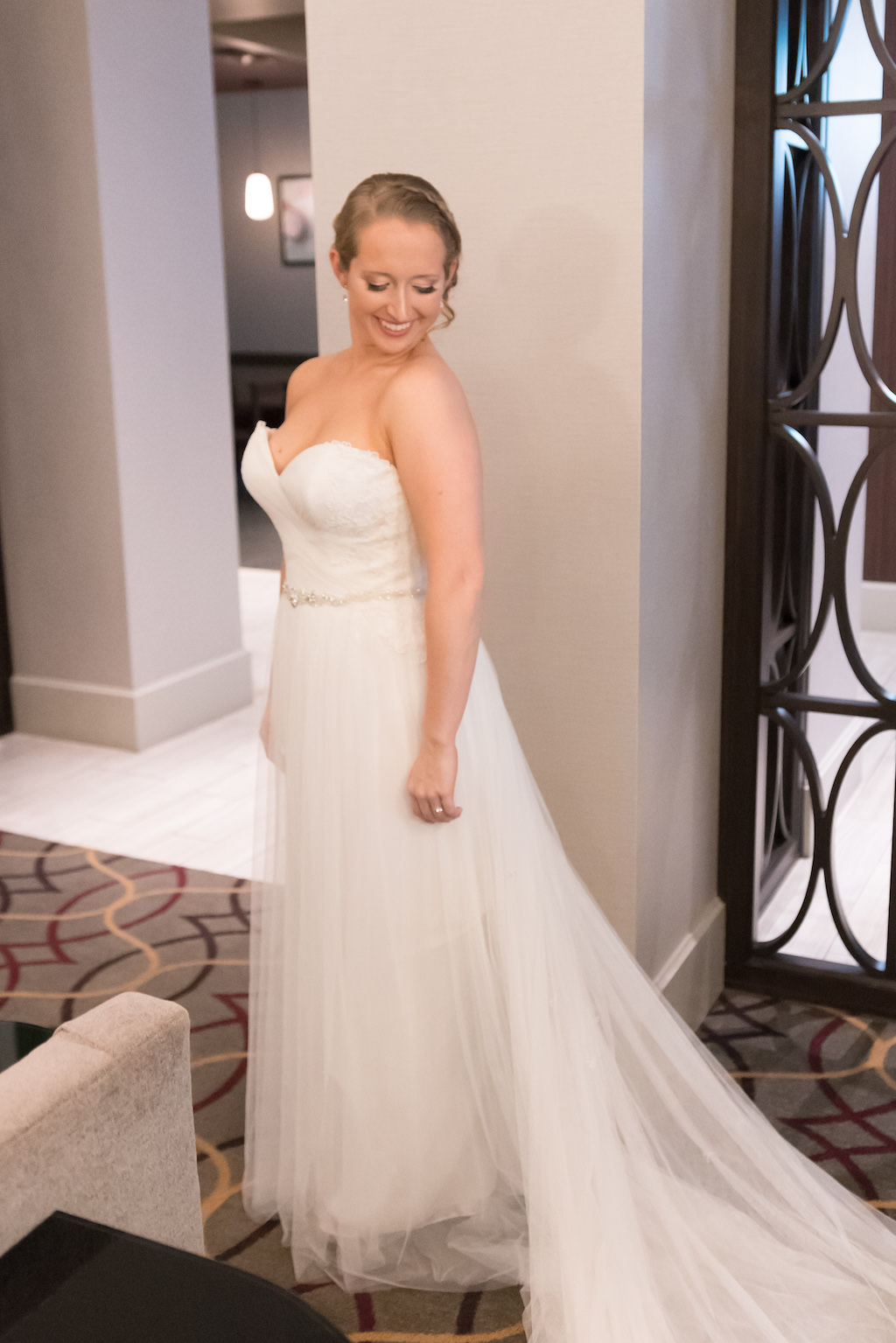 Bride Getting Ready Portrait in Strapless A Line Maggie Sottero Belted Wedding Dress | Tampa Bay Wedding Photographer Carrie Wildes Photography