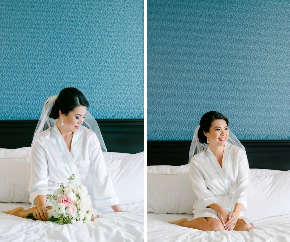 Asian Bride Getting Ready Hotel Interior Portrait, with White and Pink Bouquet and Comb Veil in White Silk Robe