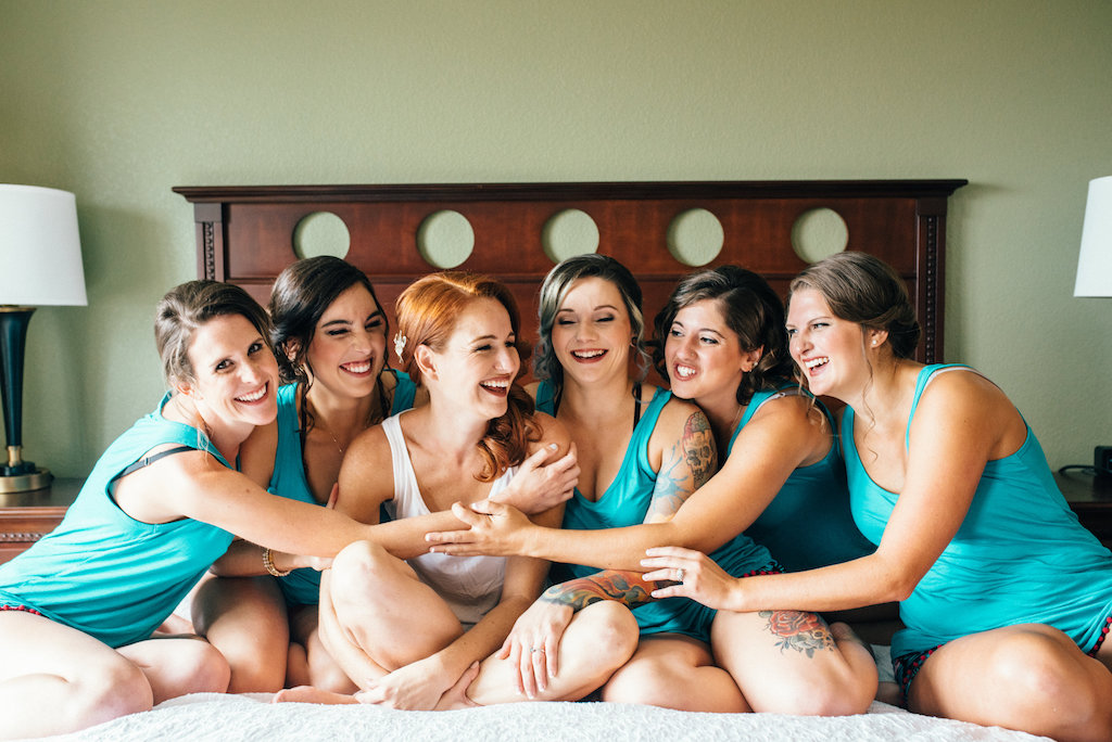 Hotel Interior Bridal Party Getting Ready Portrait in matching Teal Tank Top Pajamas