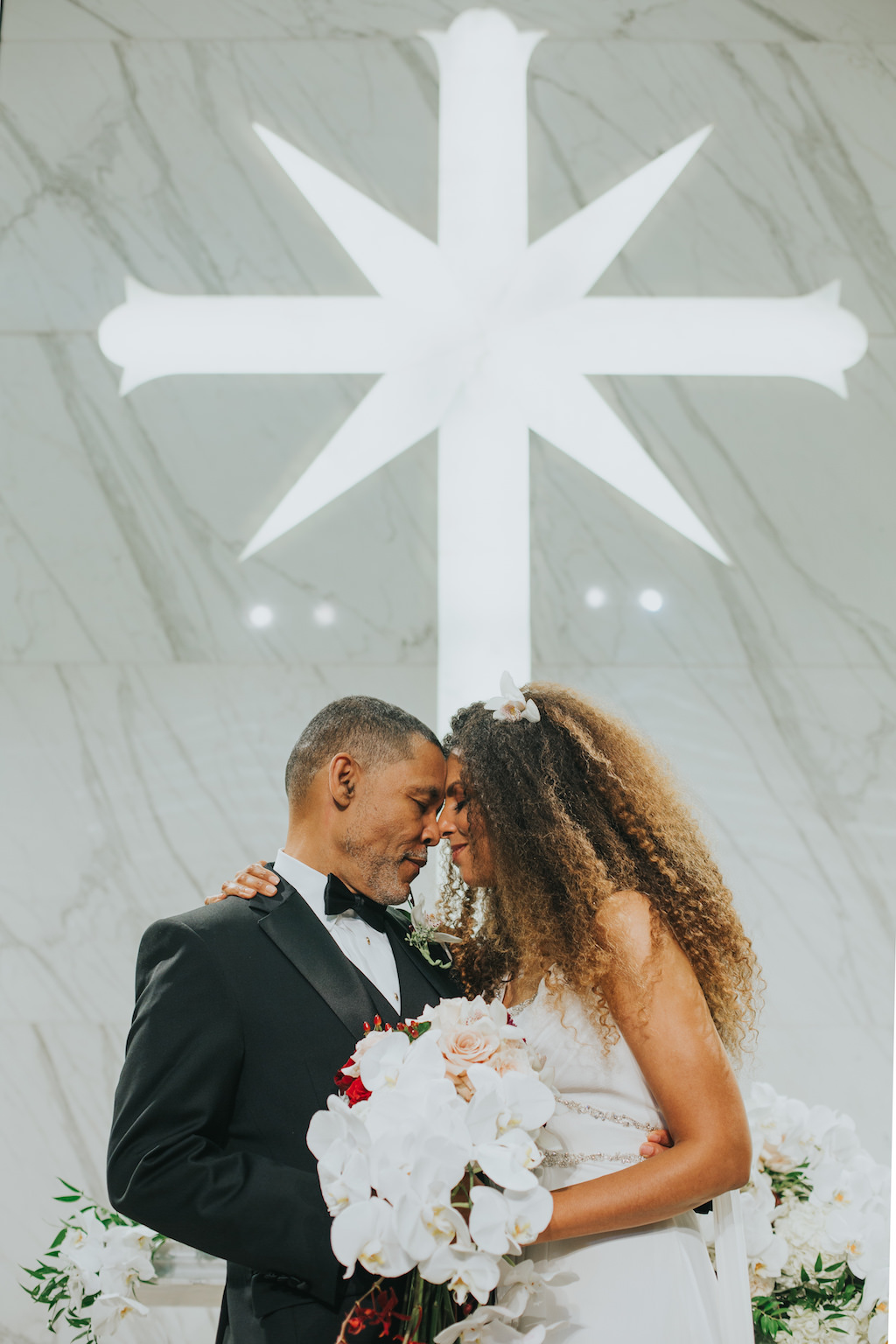 Clearwater Beach Church of Scientology Wedding Portrait, Bride with White Orchid and Red Floral Bouquet | Tampa Bay Wedding Photographer Brandi Image Photography