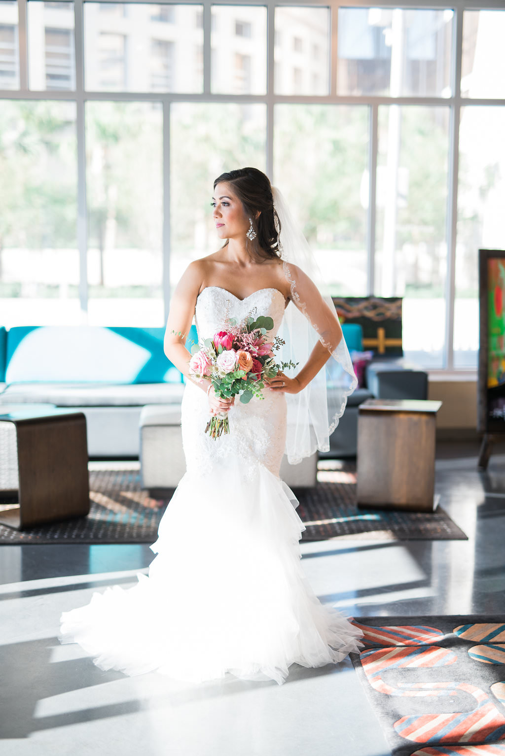Indoor Bridal Portrait in Princess Strapless Mermaid Enzoani Wedding Dress with Pink, BLush and White Floral with Greenery Bouquet | Tampa Wedding Photographer Kera Photography