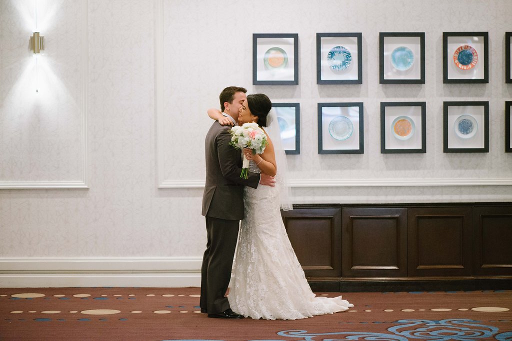 Hotel Interior Bride and Groom First Look Portrait, Bride in Strapless Allure Lace Dress