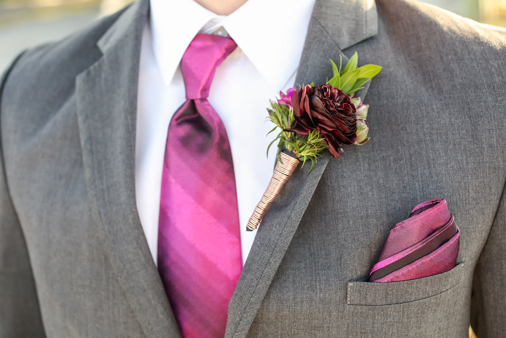 Fuchsia Floral with Greenery Ribbon Wrapped Boutonniere, Groom wearing Grey Suit with Fuchsia Tie and Pocket Square | Tampa Bay Florist Gabro Event Services | St. Pete Menswear Sacino's Formalwear