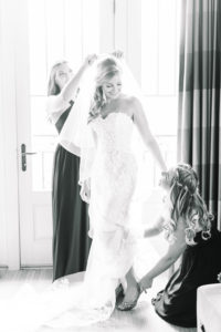 Bride and Bridesmaids Getting Ready Portrait, in Sweetheart Strapless Lace Enzoani Wedding Dress