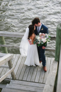Organic Greenery Inspired Neutral Pastel Wedding Ceremony Arch for Outdoor Waterfront Siesta Key Wedding | Sarasota Wedding Planner Jennifer Matteo Events