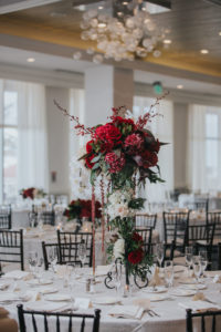 Modern, Red and White Hotel Ballroom Wedding Reception with Extra Tall Red and White Floral with Greenery Centerpiece and Brown Wood Chiavari Chairs | Hotel Wedding Venue Hyatt Regency Clearwater Beach | Tampa Bay Wedding Planner Special Moments Event Planning