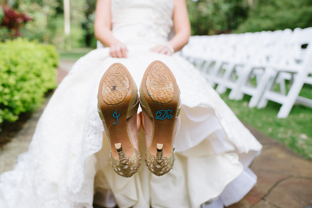 Outdoor Garden Wedding Ceremony Bridal Portrait wearing Jeweled Stiletto Shoes with Custom I DO in Blue Rhinestones on Soles