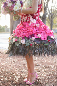 Outdoor Bridal Portrait in Creative Flower Dress with Pink, Fuchsia, Purple, Red and White Florals with Greenery and Pink Open Toe Stiletto Heels | Tampa Wedding Florist Gabro Event Services