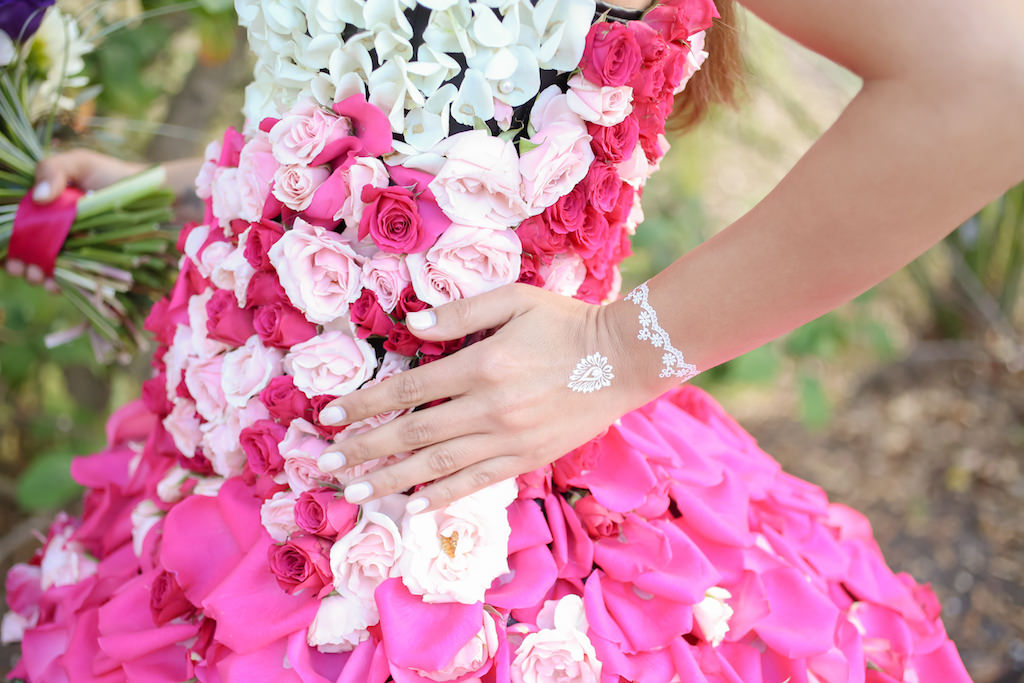 Outdoor Bridal Portrait in Creative Flower Dress with Pink, Fuchsia, Purple, Red and White Florals with Greenery and White Temporary Tattoos | Tampa Wedding Florist Gabro Event Services | Photographer Lifelong Photography Studios