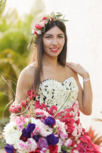Outdoor Bridal Portrait in Creative Flower Dress with Pink, Fuchsia, Purple, Red and White Florals and Greenery with Bouquet, and Rose Hair Accessory| Tampa Wedding Florist Gabro Event Services | Lifelong Photography Studio