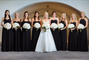 Bridal Party in Matching Black Bridesmaids Dresses with White Wedding Bouquet | Martina Liana Wedding Dress
