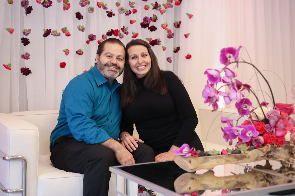 Floral Wedding Decor with Driftwood Centerpiece with Red Roses, Purple Orchids, Grasses and Succulents and Hanging Carnation Flowers | Tampa Bay Wedding Florist Gabro Event Services | Photographer Lifelong Photography Studio