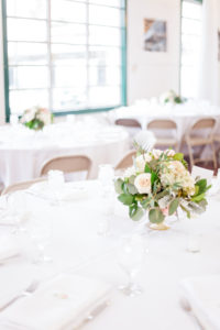 Indoor Wedding Reception with Round White Tables and Small Peach and White Floral with Greenery Centerpiece | Tampa Bay Wedding Florist Cotton and Magnolia | Venue St Petersburg Shuffleboard Club