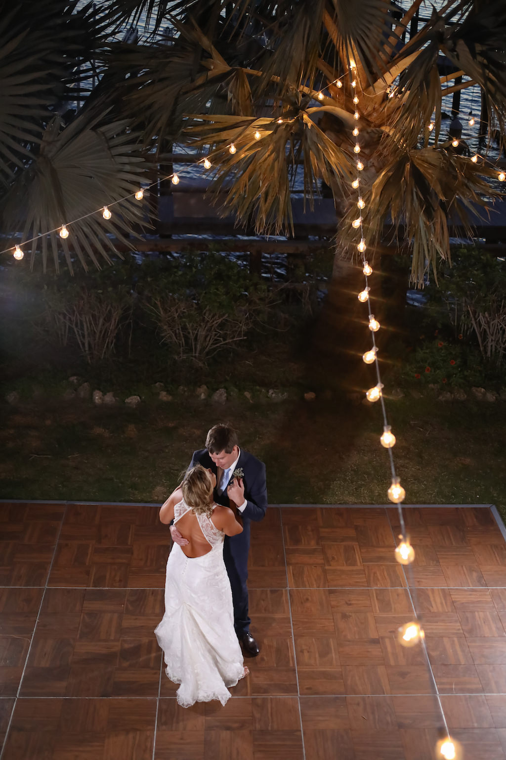 Outdoor Garden Wedding First Dance Portrait with String Lights, Bride in Open Back Lace Dress | St Petersburg Wedding Photographer Lifelong Photography Studio