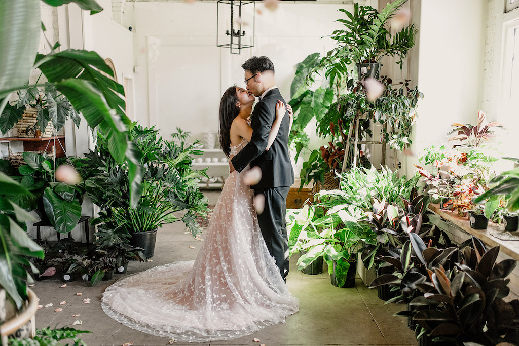Indoor Wedding Ceremony Portrait, Bride in Peach and White Lace Wedding Dress, with living Greenery | Tampa Intimate Elopement Venue Fancy Free Nursery