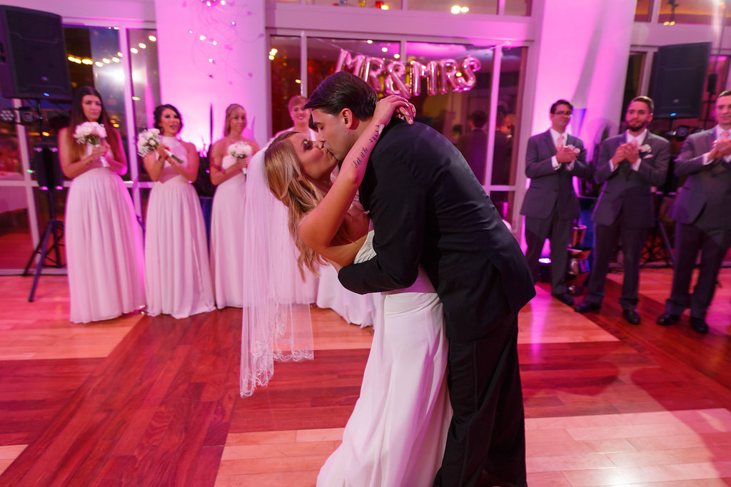 Indoor Wedding Reception First Dance Portrait, Bridesmaids in Blush Dresses, Groomsmen in Gray Suits, with Mr and Mrs Balloon Letter Banner