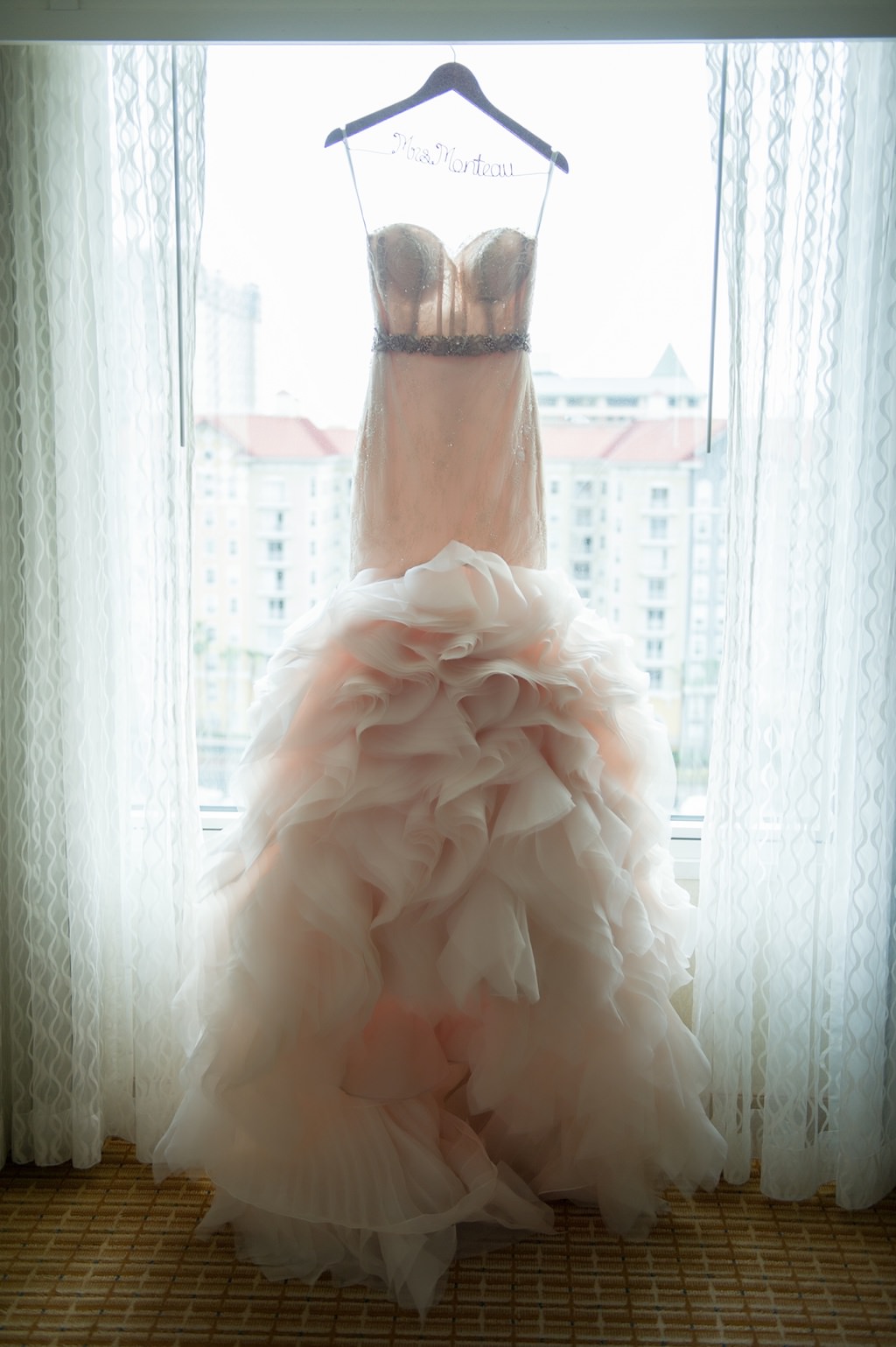 Blush Layered Mermaid Wedding Dress on Personalized Hanger