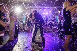 Hotel Ballroom Wedding Reception First Dance Portrait, with Confetti Bomb | St Pete Wedding Planner Parties A La Carte | Historic Venue The Don CeSar | Photographer Marc Edwards Photographs