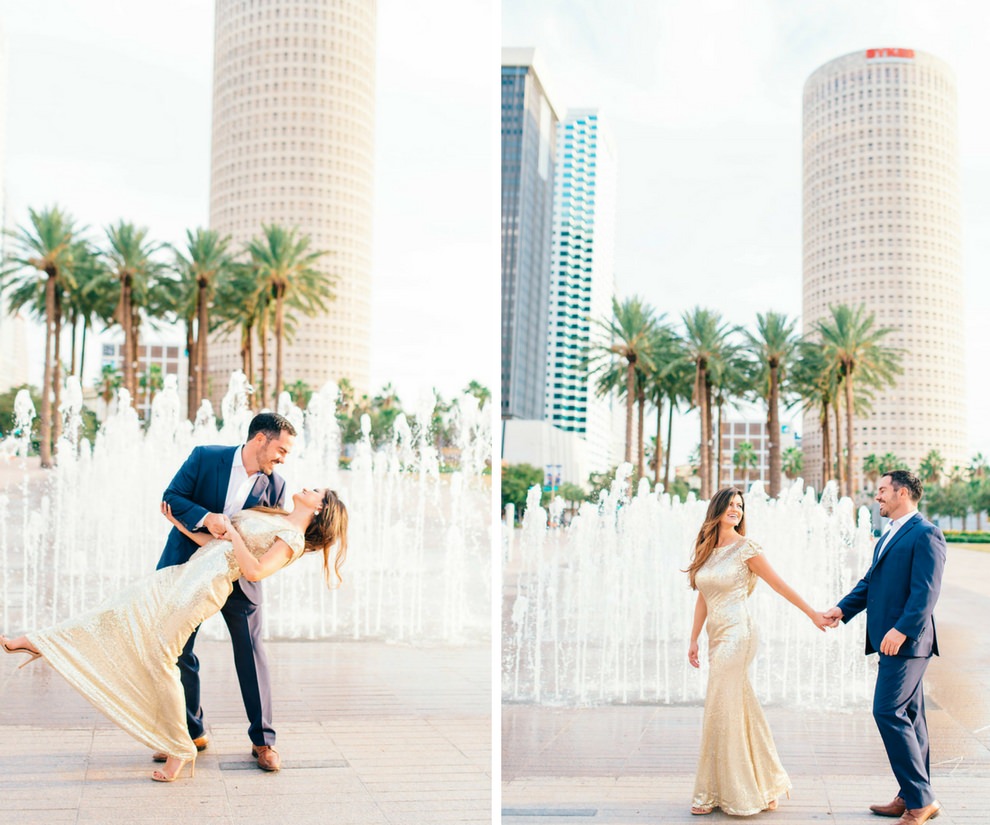 Downtown Tampa Riverwalk Classy Engagement Portrait, Bride in Long Gold Sequin Dress, Groom in Navy Blue Suit with Brown Leather Shoes