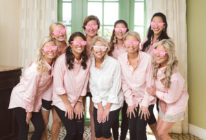 Bridesmaids Bridal Party Photo with Matching Pink Oxford Shirts and Sunglasses