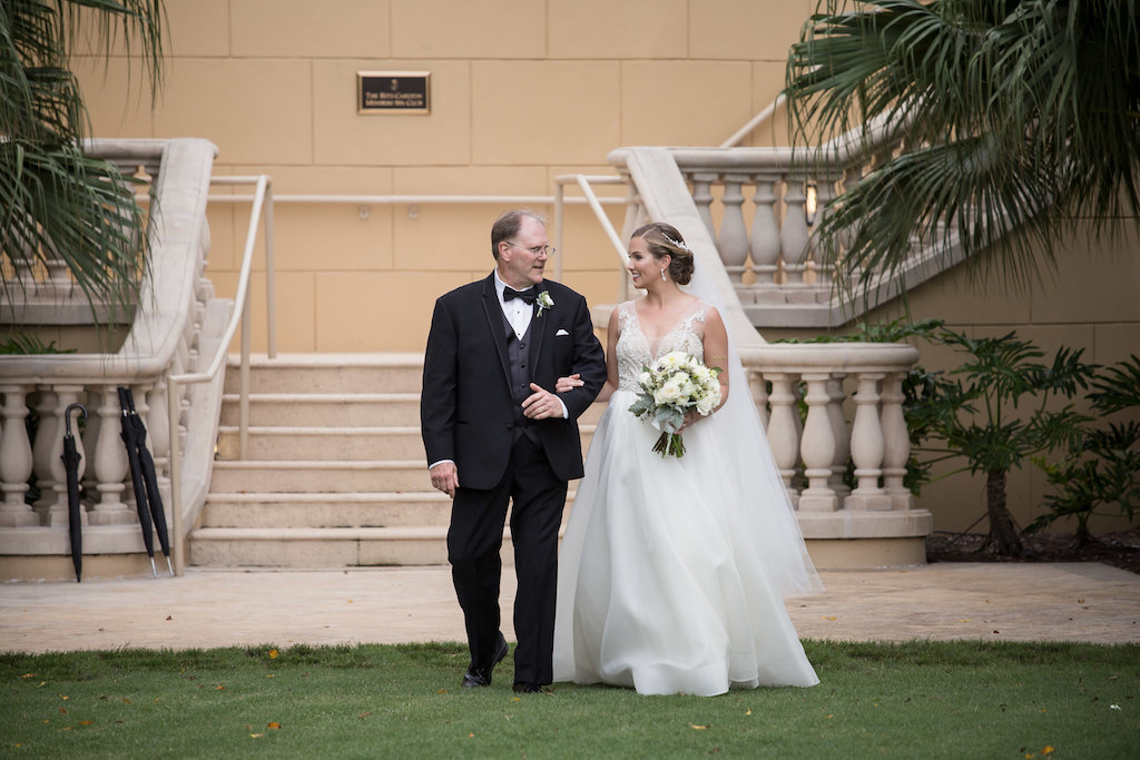 Outdoor Hotel Garden Wedding Ceremony Portrait, Bride in A Line WEdding Dress with White Rose and Greenery Bouquet | Sarasota Wedding Photographer Cat Pennenga Photography