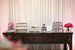 Floral Wedding Reception Industrial Vintage Dessert Table with Small Pink Rose FLowers and Tiered Dessert Trays | Tampa Wedding Rentals and Florist Gabro Event Services
