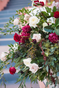 Outdoor Wedding Flower Arrangement with White and Red Roses with Greenery