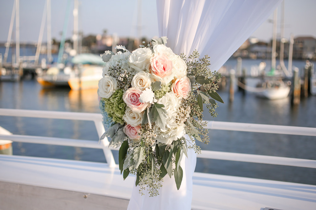 Outdoor Waterfront Wedding Ceremony Decor with White Draping, Blush Pink and White Rose with Greenery Florals | Clearwater Beach Unique Wedding Venue Yacht Starship