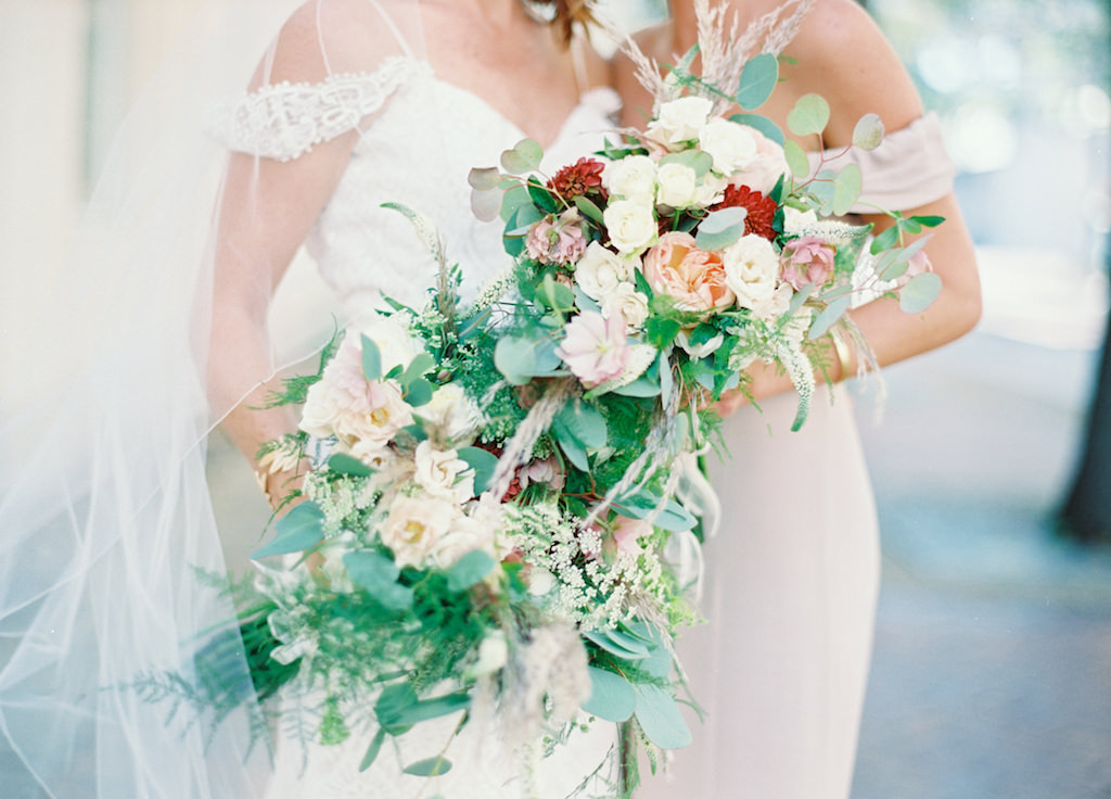 Outdoor Bride and Bridesmaid Portrit with Blush Pink, Red, and White Floral with Natural Greenery Bouquet
