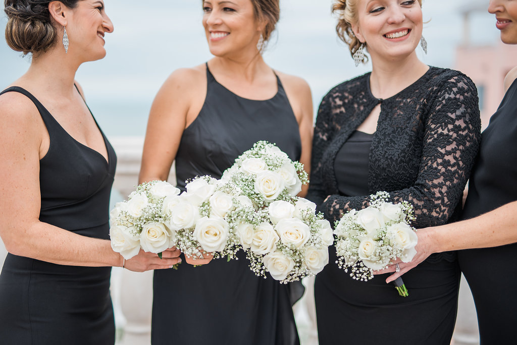 Outdoor Wedding Ceremony Bridal Party Portrait in Mismatching Black Dresses with White Rose and Baby's Breath Bouquet | Clearwater Wedding Florist Apple Blossoms Floral Designs | Tampa Bay Photographer Kera Photography