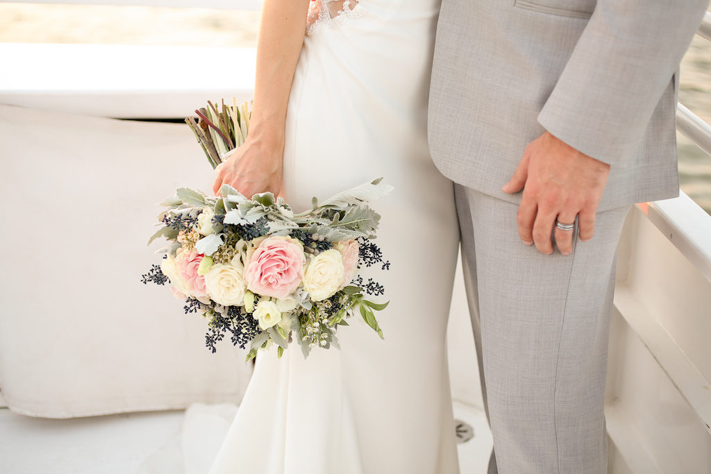 Outdoor Waterfront Wedding Portrait, Groom in Grey Linen Suit, Bride with Blush Pink and White Rose with Blue Berries and Greenery Bouquet | Clearwater Beach Unique Wedding Venue Yacht Starship | Photographer Lifelong Photography Studios