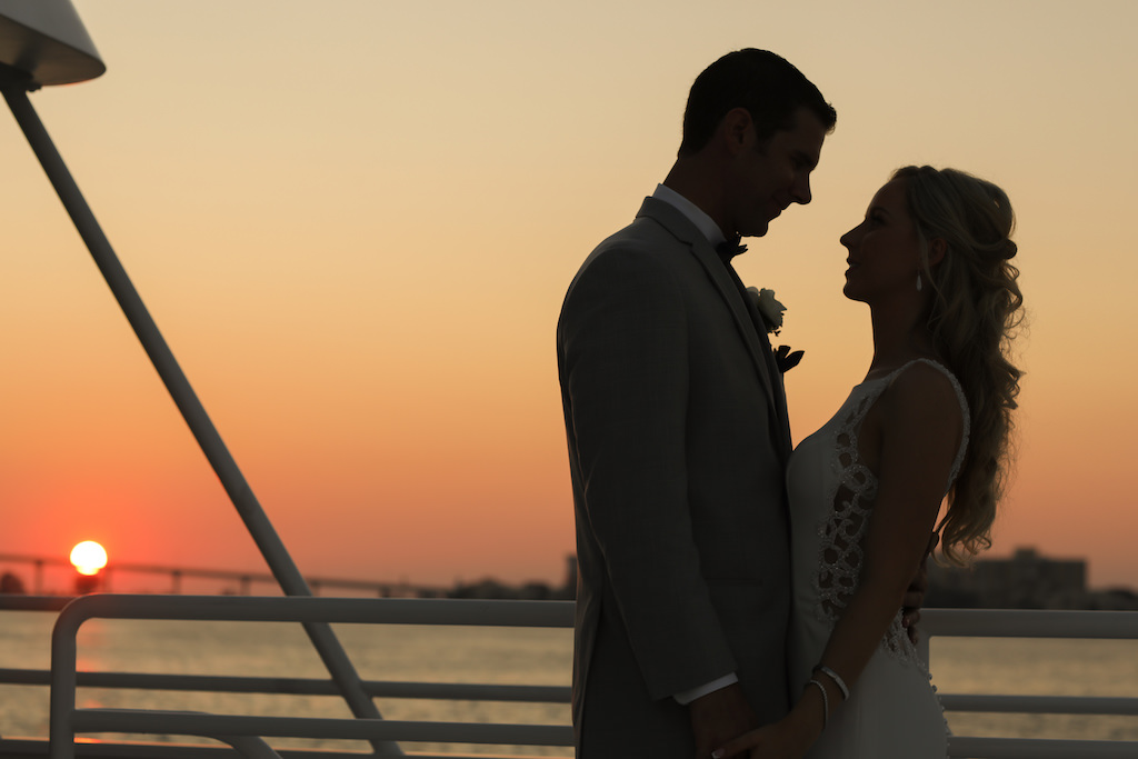 Outdoor Waterfront Wedding Portrait, Groom in Grey Linen Suit, Bride with Blush Pink and White Rose with Blue Berries and Greenery Bouquet | Clearwater Beach Unique Wedding Venue Yacht Starship | Photographer Lifelong Photography Studios