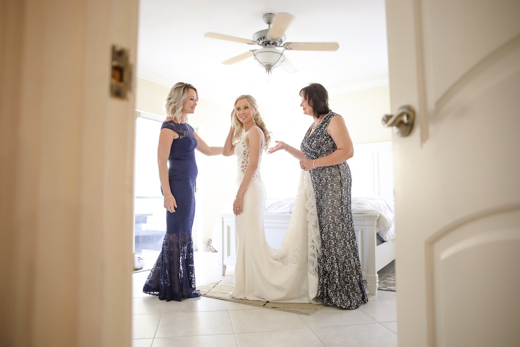 Bride Getting Ready Portrait with Mother and Bridesmaid in Cut Out Lace Side Column Dress, Bridesmaid in Blue Lace Dress | Tampa Bay Wedding Photographer Lifelong Photography Studio
