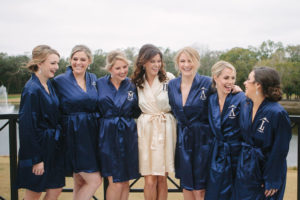 Outdoor Bridal Party Getting Ready Portrait in Customized Monogrammed Navy Blue Silk Robes