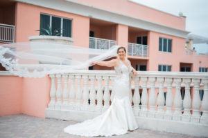 Outdoor Waterfront Hotel Rooftop Portraits, Bride in Lace Illusion Back V Neck Mermaid Dress | Tampa Bay Wedding Photographer Kera Photography | Venue Hyatt Regency Clearwater Beach