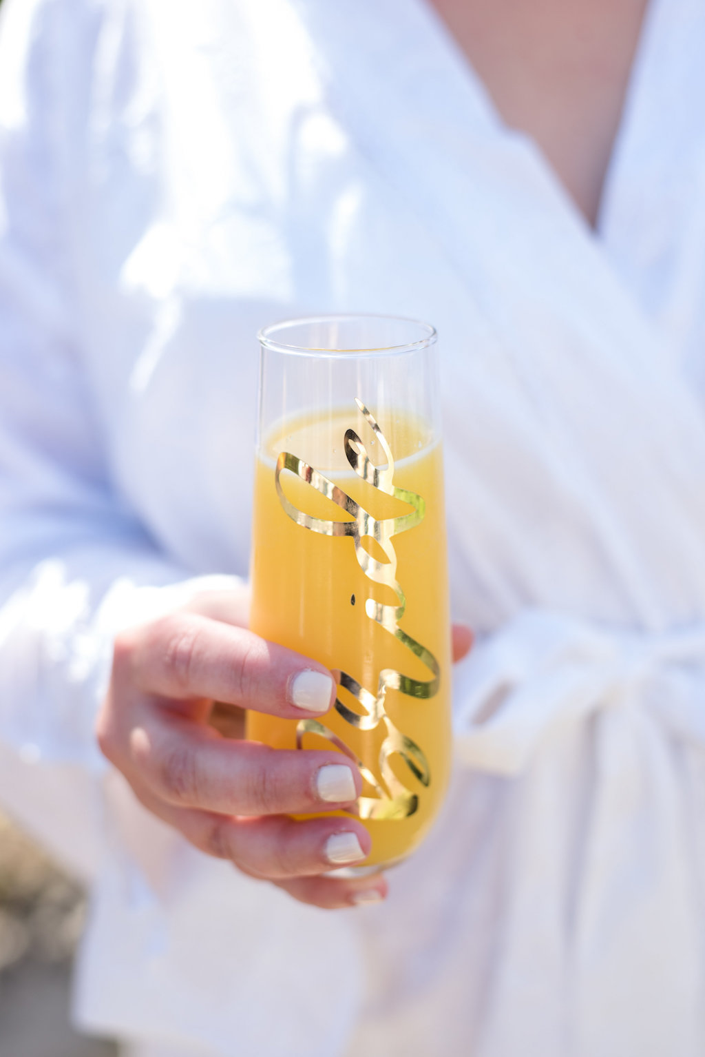 Outdoor Bridal Getting Ready Portrait with Mimosa Glass with Gold Lettering | Tampa Bay Wedding Photographer Caroline and Evan Photography