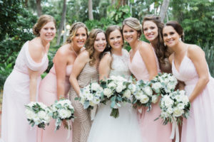Outdoor Bridal Party Portrait, Bridesmaids in Mismatched Blush Pink and Sequin Bella Bridesmaids Dresses, with White Floral and Greenery Bouquet with Ribbon