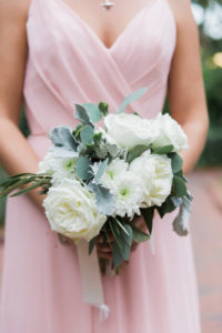 Outdoor Bridesmaid Portrait In Blush Pink aDress, with White Floral and Greenery Bouquet with Ribbon