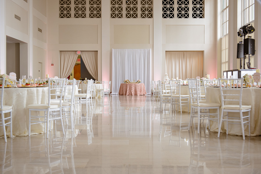 Elegant Wedding Reception with Round Tables, White Chiavari Chairs and Ivory Linens, Pink textured Linen Sweetheart Table with White Draping | Downtown Tampa Wedding Venue The Vault