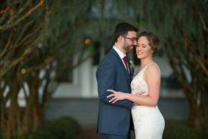 Creative Southern Romantic Wedding Portrait, Bride in Lace V Neck Paloma Blanca Dress, Groom in Gray Suit with Burgundy Red TIe and Succulent Greenery Boutonniere | Tampa Bay Wedding Photographer Andi Diamond Photography | Venue Palmetto Riverside Bed and Breakfast