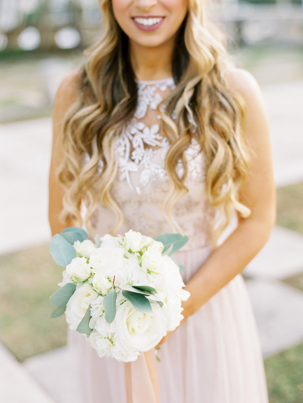 Outdoor Bridesmaid Wedding Portrait in Champagne Floral Lace Illusion Halter Blush Amsale Dress, with White Floral and Greenery Bouquet | Tampa Dress Shop Bella Bridesmaids