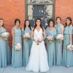 Outdoor Downtown Bridal Party Portrait, Bride in Sweetheart A Line Wedding Dress with White and Pink Rose with Greenery Bouquet, Bridesmaids in Mismatched Sage Green Show Me Your Mumu Dresses | Tampa Wedding Photographer Andi Diamond Photography