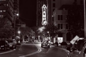 Downtown Tampa Wedding Exit Portrait in Antique Car with Tampa THeater Sign