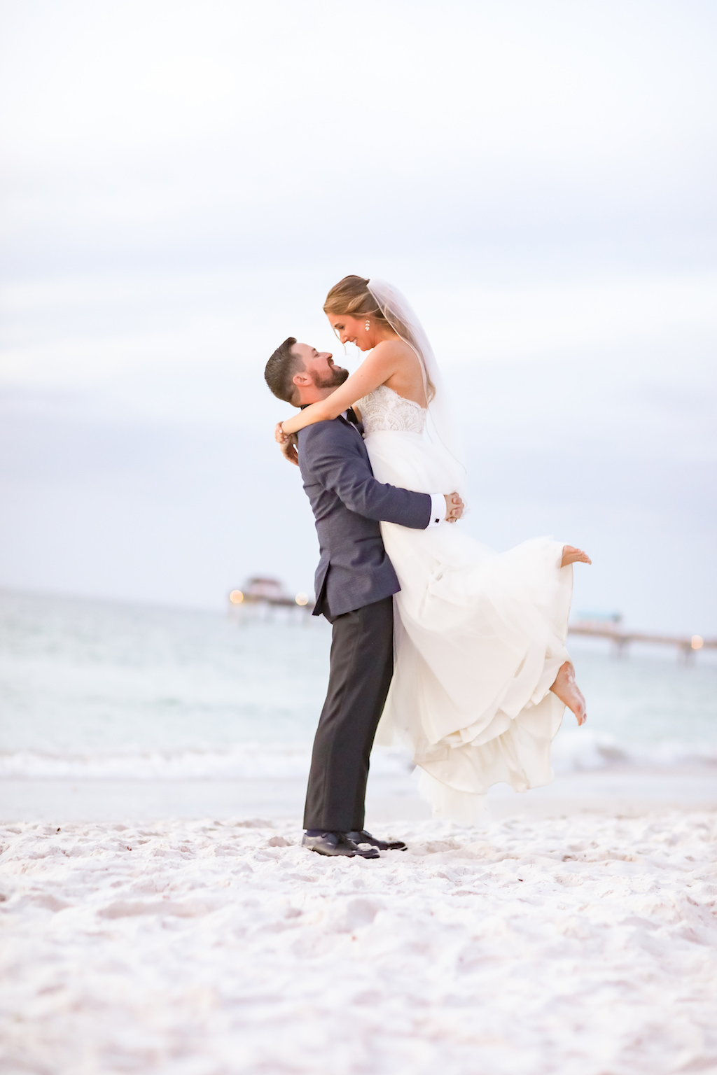 Outdoor Beach Wedding Portrait, Bride in Strapless Wtoo Bridal Dress, Groom in Gray and Black Suit | Tampa Bay Wedding Photographer Lifelong Studios Photography